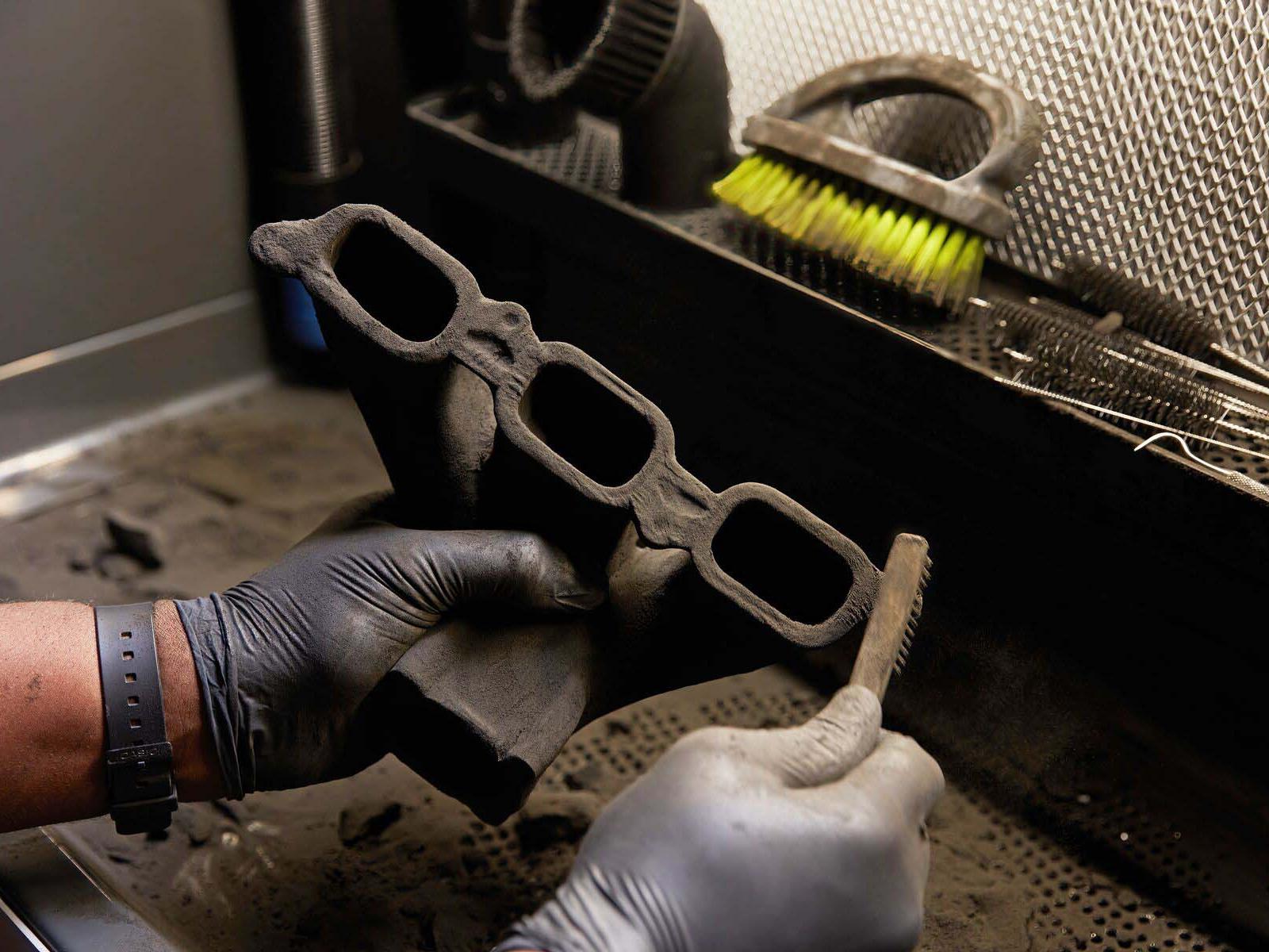 ein bauteil dem pulver entfernt wird